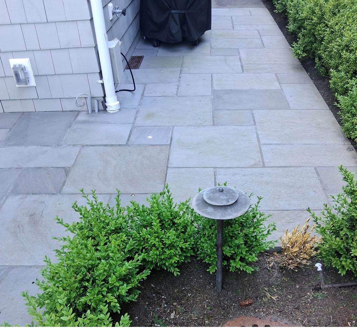 Bluestone patio with drainage detail
