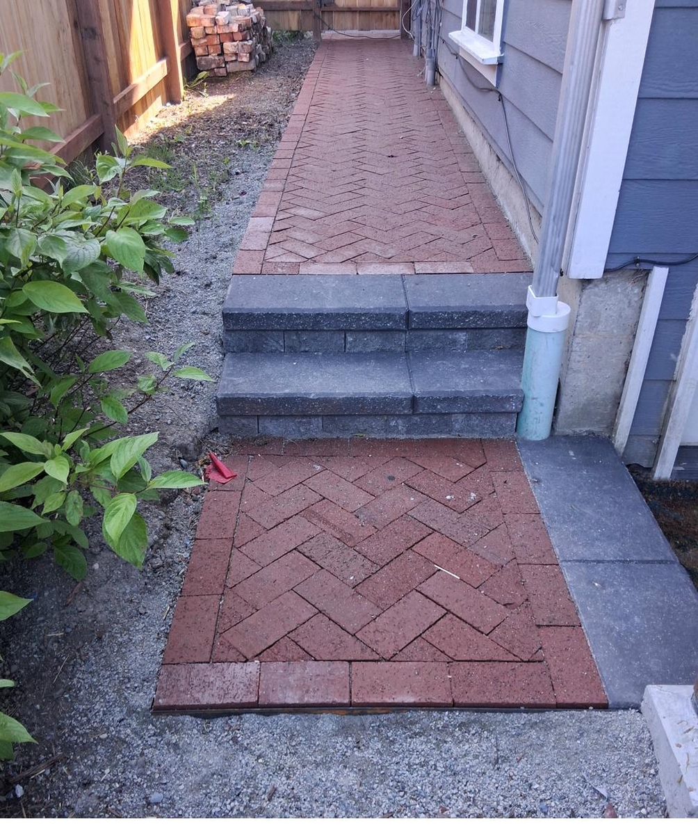 Brick herringbone side yard pathway with steps