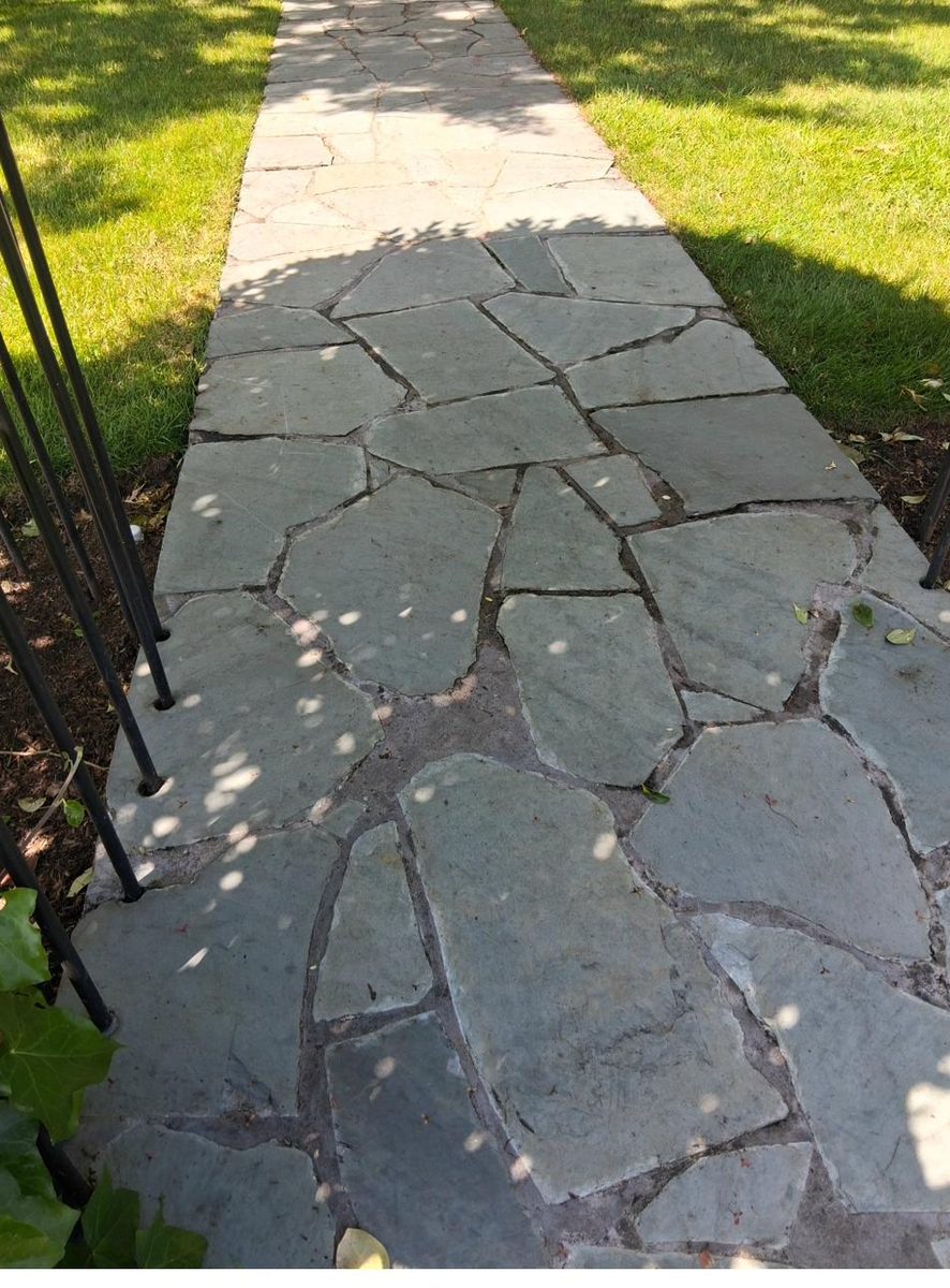 Flagstone walkway through lawn